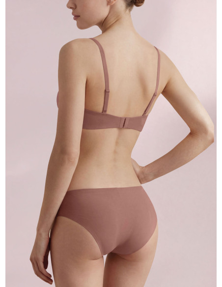 Infiore Naturalfit seamless brief in caramel bonded cotton worn by a model, back view.
